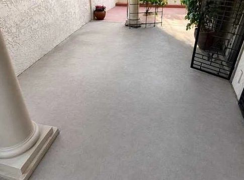 Clear concrete courtyard and walkway